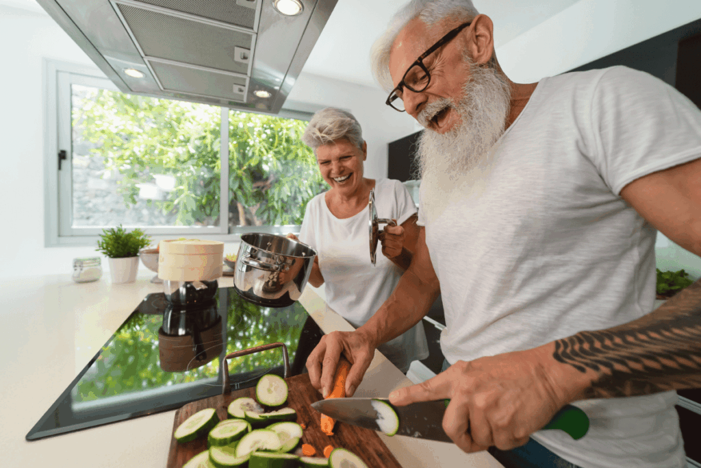 Nutrition for Older Adults - older man and woman cooking in a kitchen